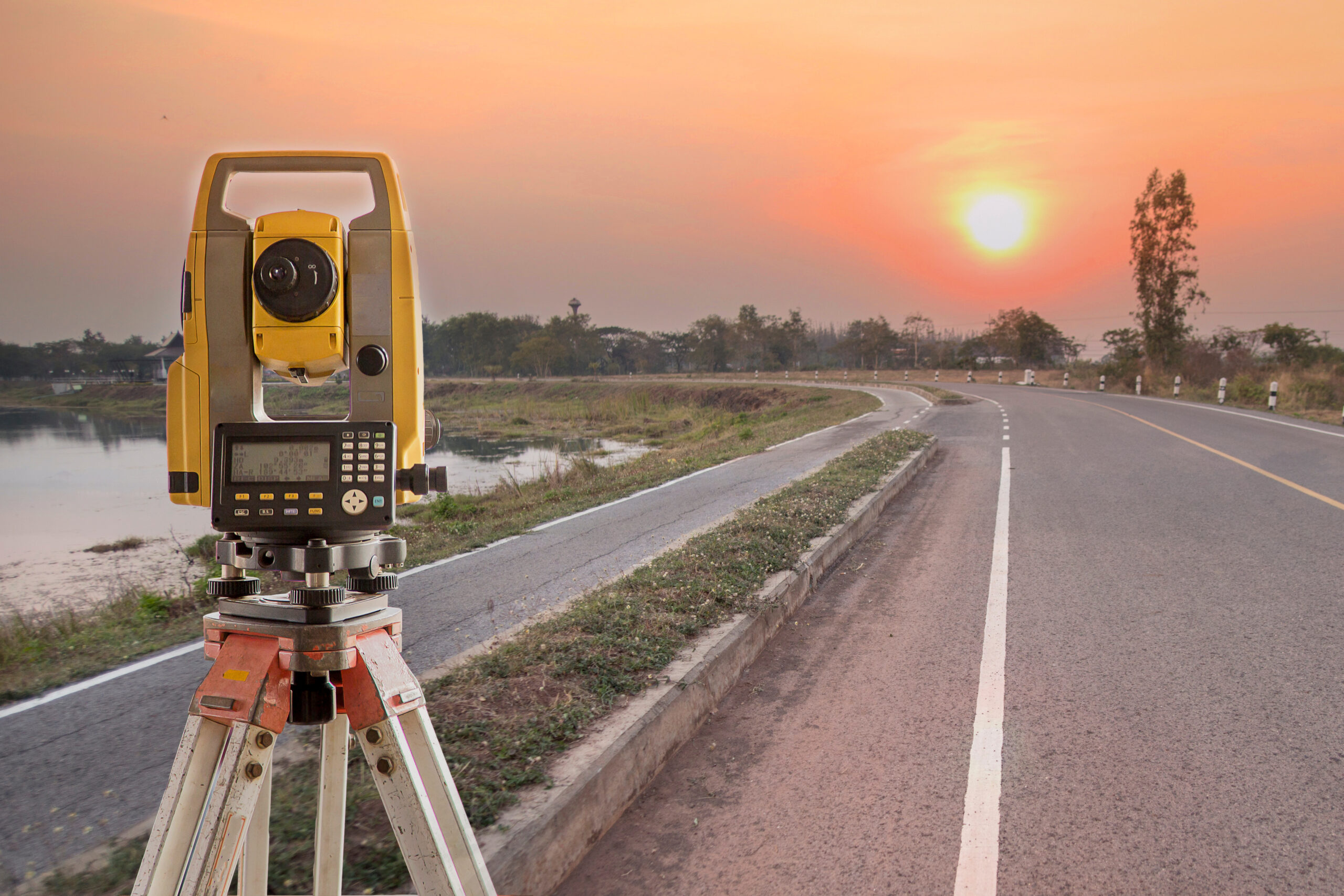 Surveyor equipment tacheometer or theodolite outdoors at constru